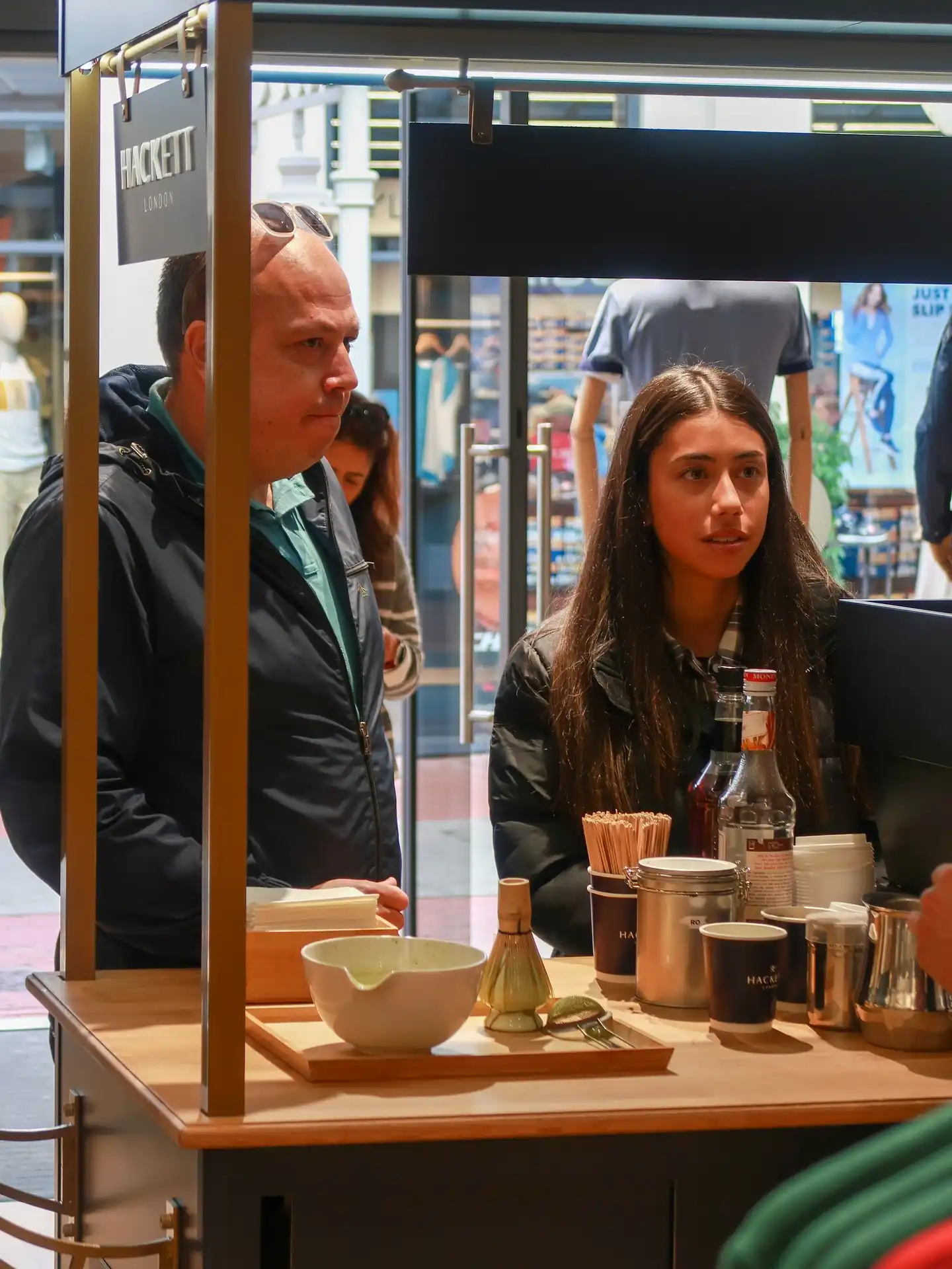 UK high street with independent coffee shops and pedestrians