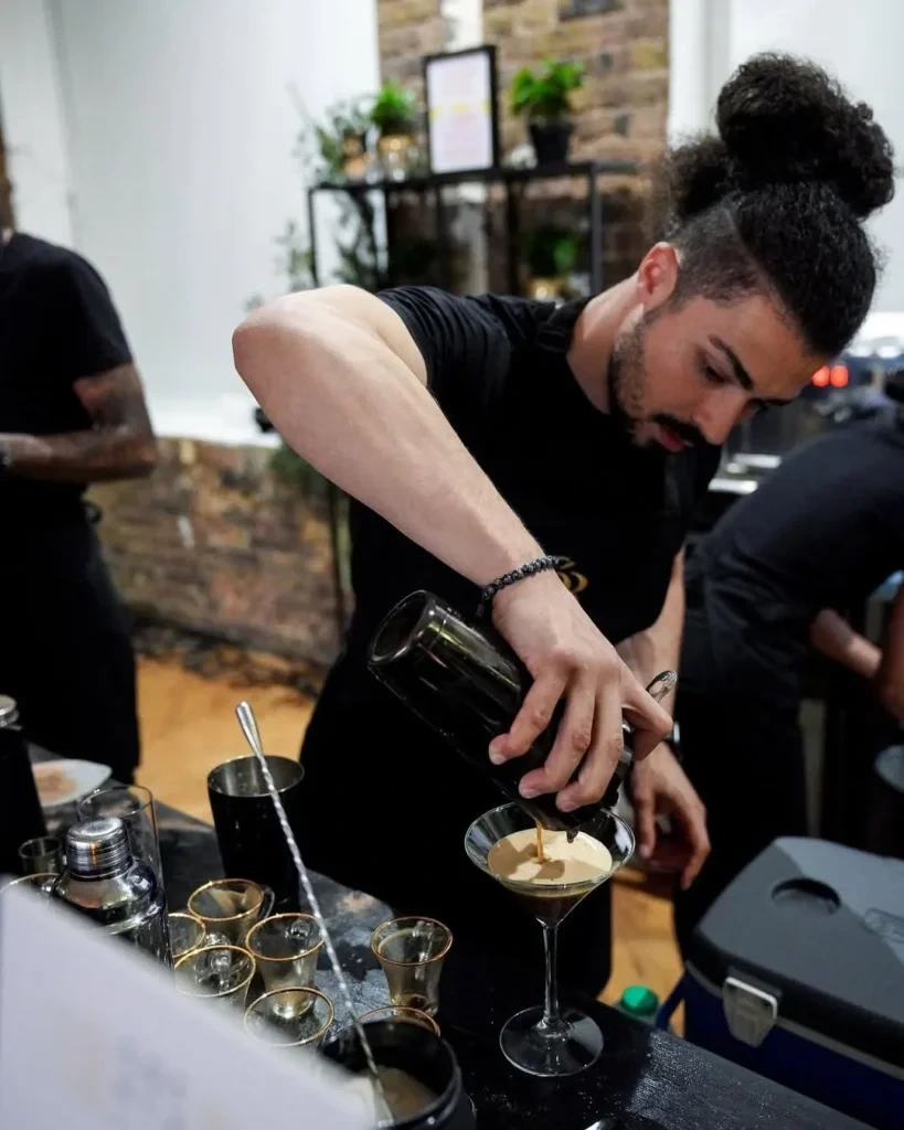 Busy thriving coffee shop with efficient barista service during peak hours